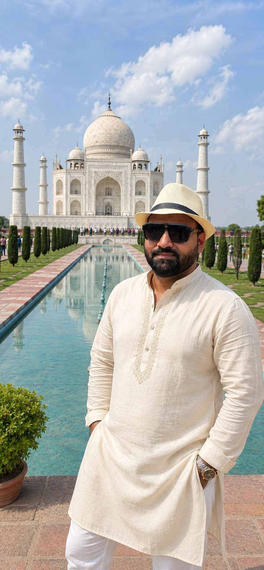 Arif Khan standing before the Taj Mahal in Agra